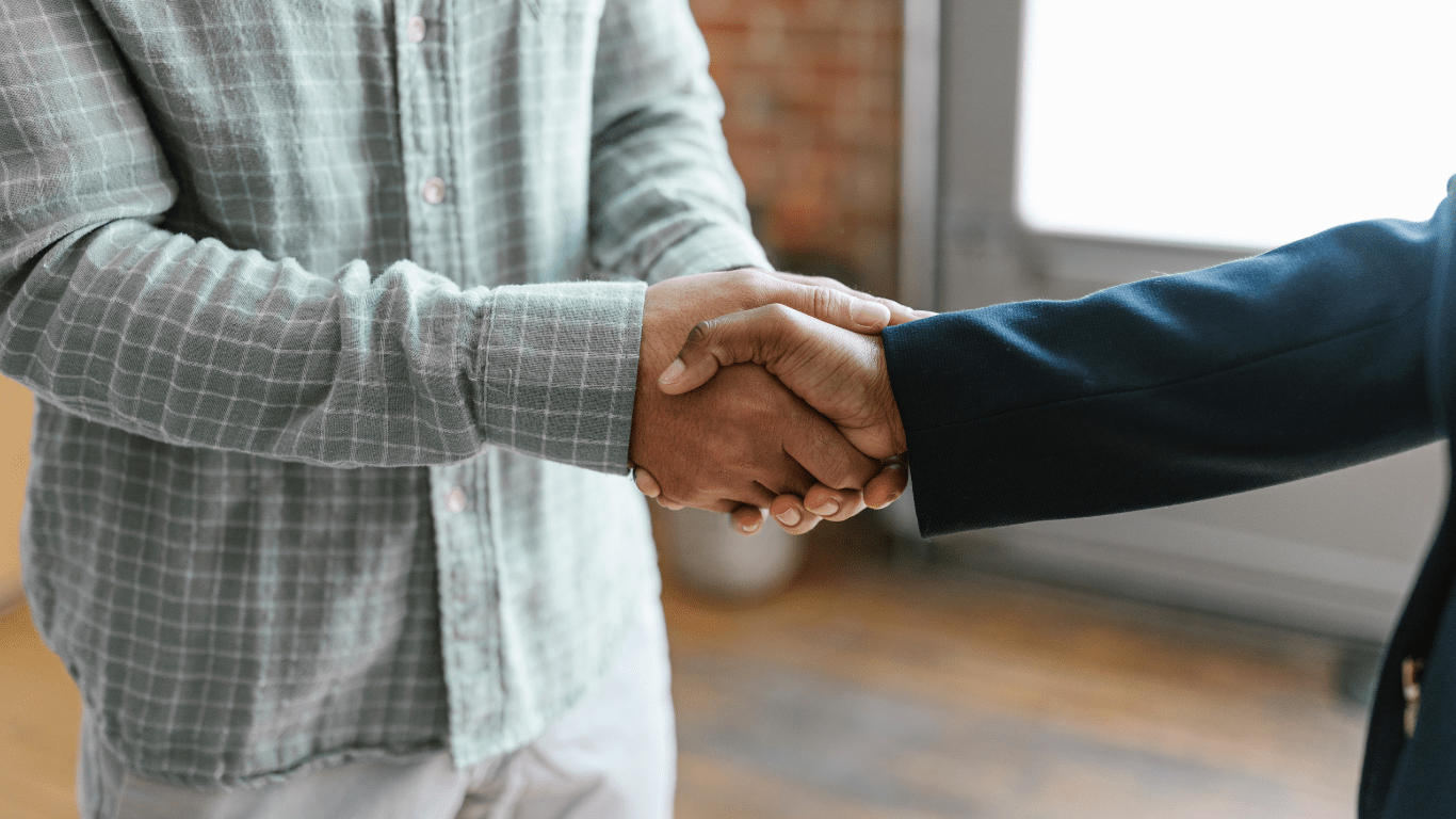 two people shaking hands